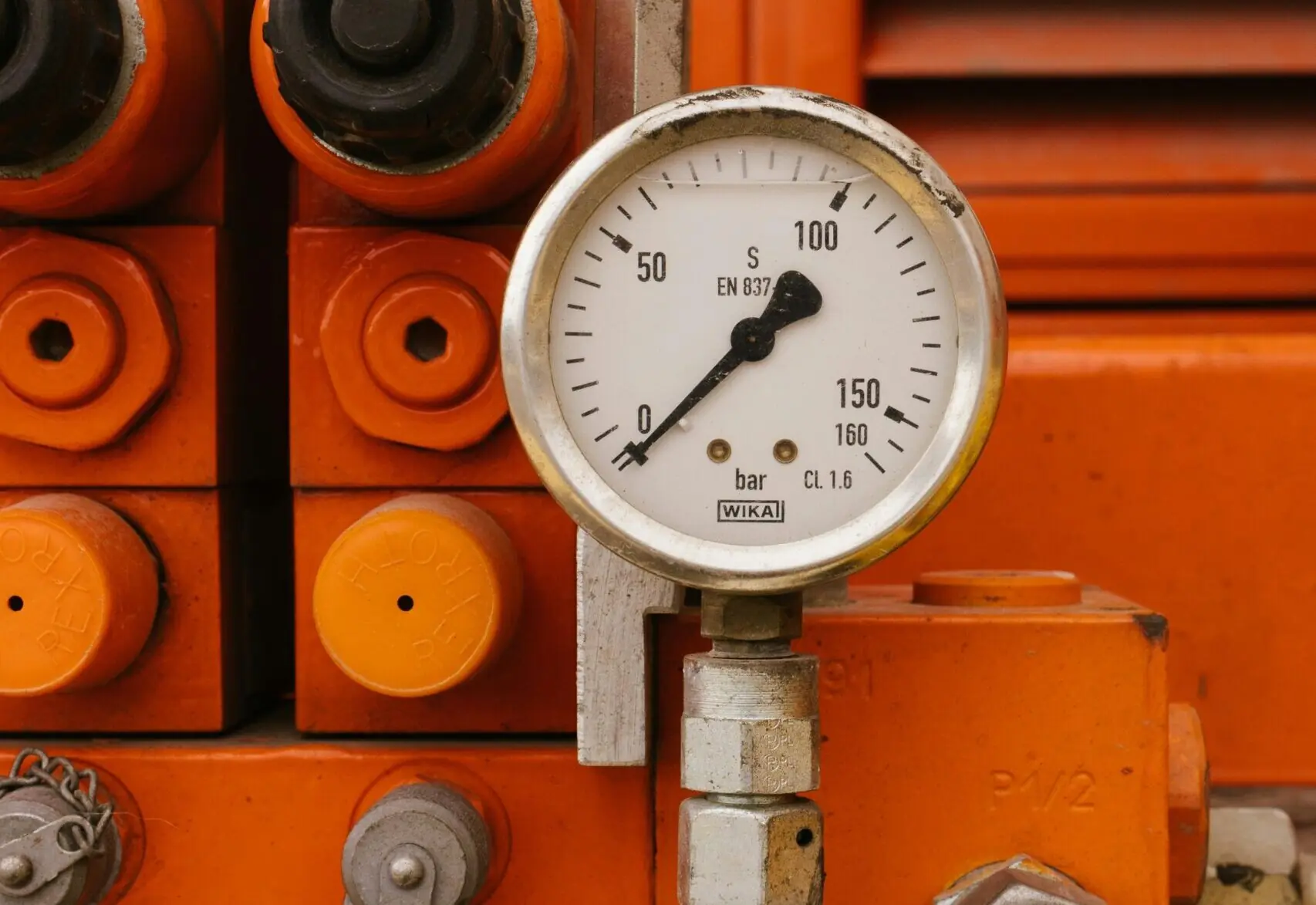 Druksysteem voor een oranje machine